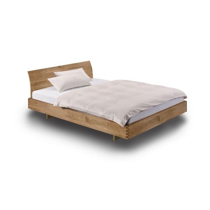 Zwevend massief houten bed STEP-X met gebogen hoofdbord Holzmanufaktur wild eiken