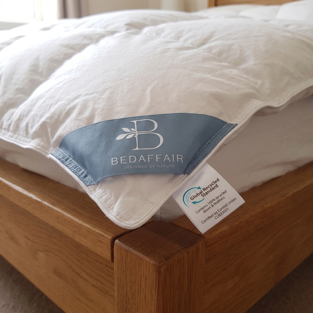 gerecycled dons dekbed met grs label en Bedaffair logo